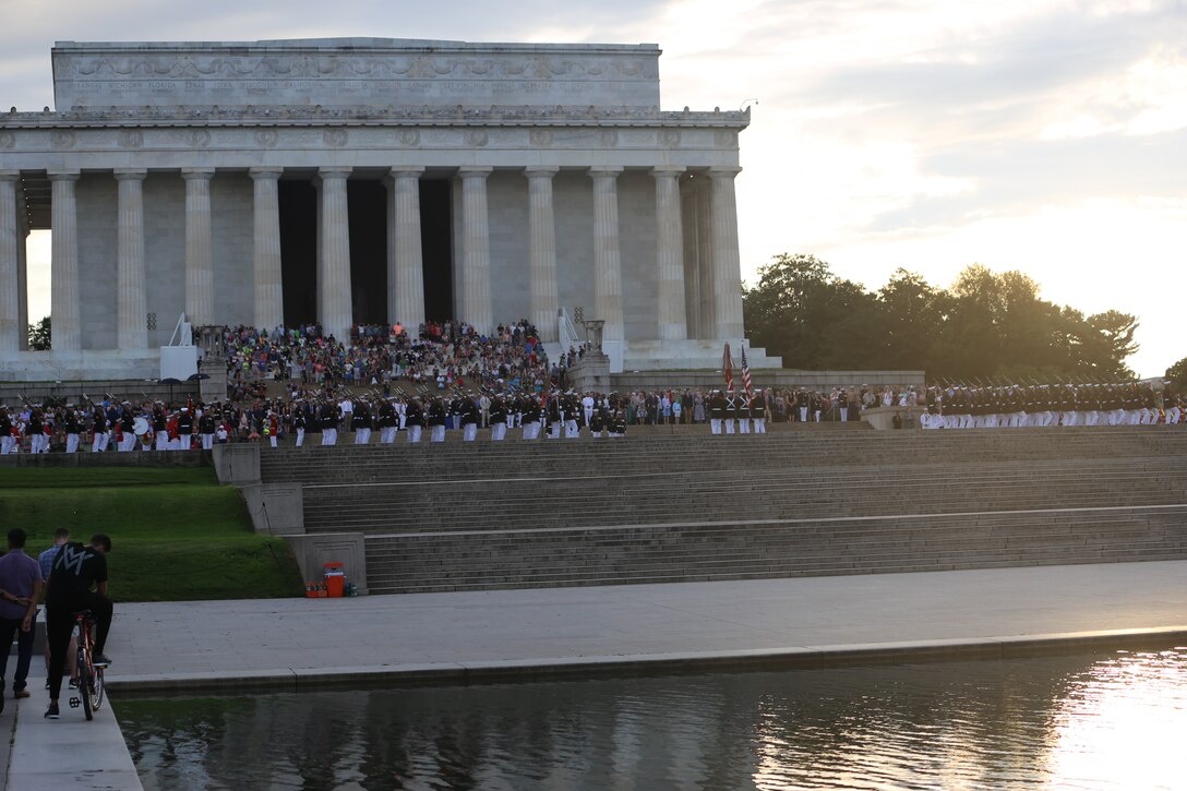 Marines with Marine Barracks Washington D.C., perform during the Sunset Parade at the Lincoln Memorial, Washington D.C., June 19, 2018. The guest of honor for the parade was Vice Adm. Ocatavio Trejo Hermida, Mexico Naval Attaché, and the hosting official was Brig. Gen. Dimtri Henry, director of intelligence.