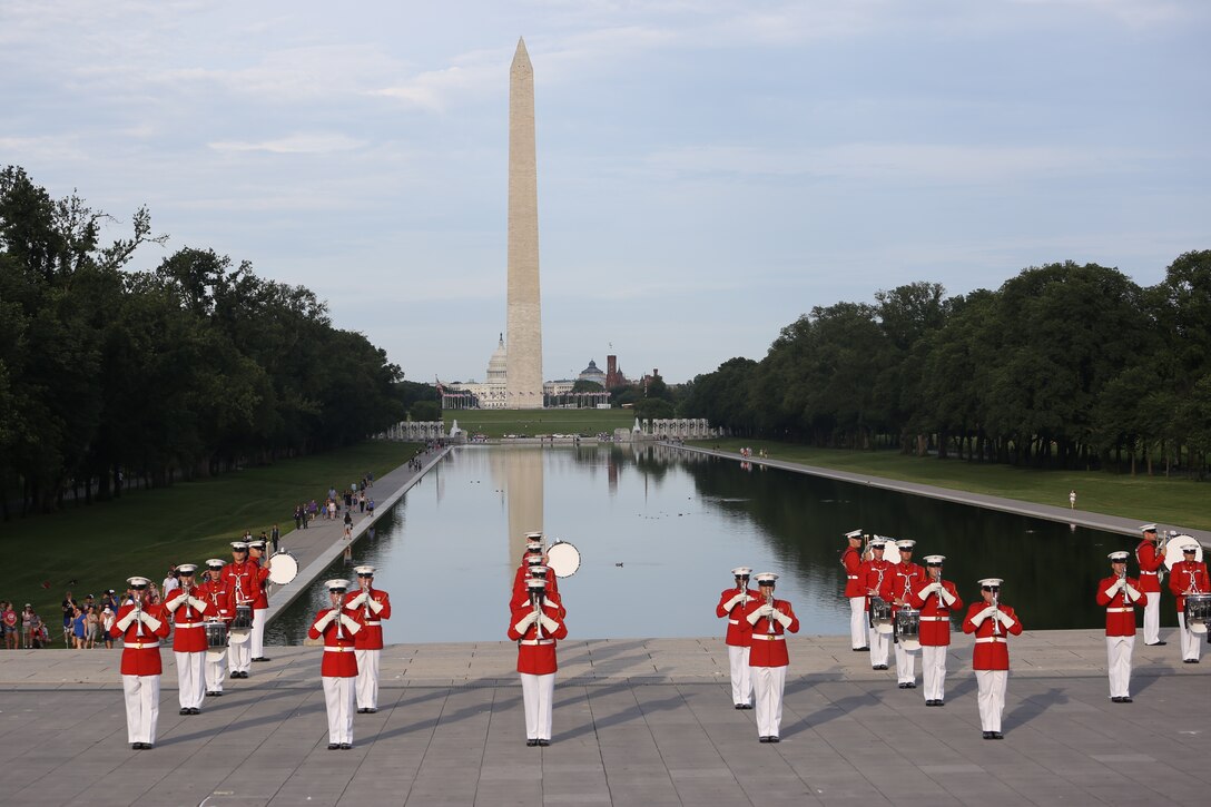 Marines with “The Commandant’s Own” Marine Drum & Bugle Corps prepare to perform a musical ballad during the Sunset Parade at the Lincoln Memorial, Washington D.C., June 19, 2018. The guest of honor for the parade was Vice Adm. Ocatavio Trejo Hermida, Mexico Naval Attaché, and the hosting official was Brig. Gen. Dimtri Henry, director of intelligence.
