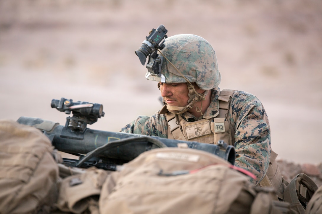Cpl. Tim Bracken, a fire team leader with Company A, 1st Battalion, 23rd Marine Regiment, 4th Marine Division, positions his gear prior to the conclusion of an air assault course, during Integrated Training Exercise 4-18, aboard Marine Corps Air Ground Combat Center Twentynine Palms, Calif., June 17, 2018. ITX 4-18 provides Marine Air-Ground Task Force elements an opportunity to undergo service-level competency assessments so that they can seamlessly integrate with active duty Marines in the event of a crises that requires a rapid response. (U.S. Marine Corps photo by Cpl. Dallas Johnson/Released)