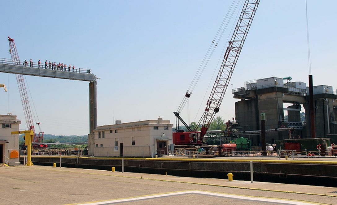 Members of the district and visit observe the work at Lock and Dam 4 on the Monongahela River at Charleroi.