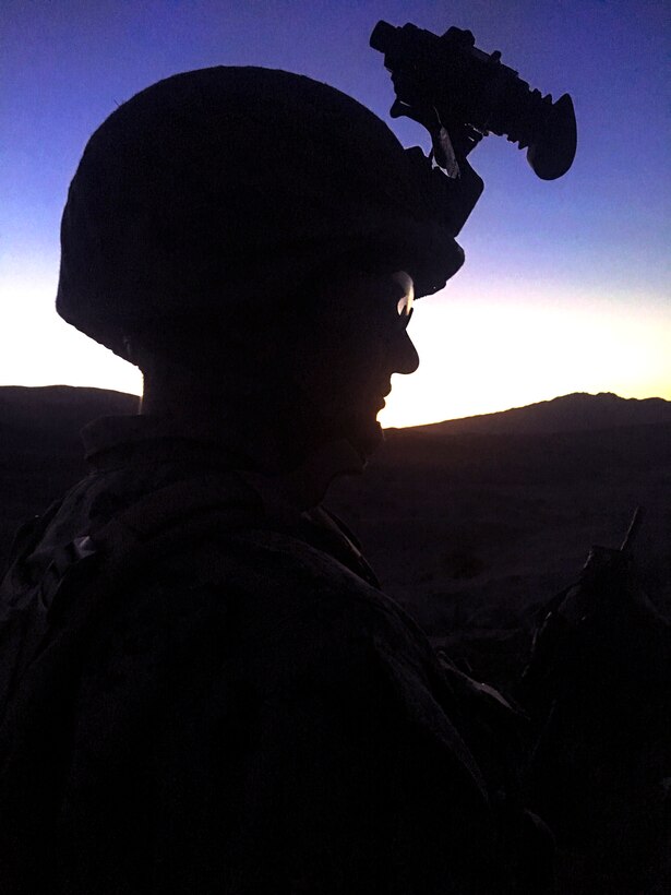 Cpl. Tim Bracken, a fire team leader with Company A, 1st Battalion, 23rd Marine Regiment, 4th Marine Division, anticipates a night attack from a notional enemy during an air assault course at Integrated Training Exercise 4-18, aboard Marine Corps Air Ground Combat Center Twentynine Palms, Calif., June 17, 2018. ITX 4-18 provides Marine Air-Ground Task Force elements an opportunity to undergo service-level competency assessments so that they can seamlessly integrate with active duty Marines in the event of a crises that requires a rapid response. (U.S. Marine Corps photo by Cpl. Dallas Johnson/Released)