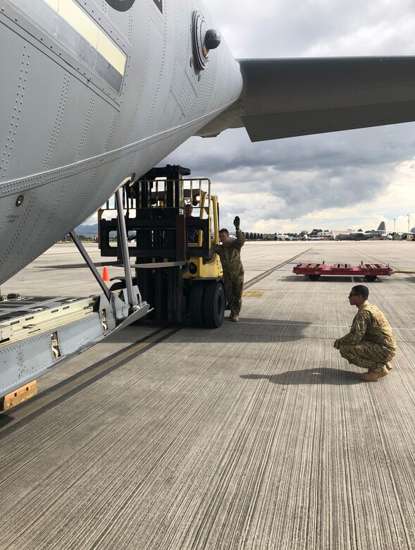 Dyess Airmen unload school supplies in Colombia