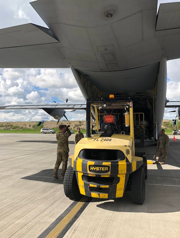 Dyess Airmen unload school supplies in Colombia