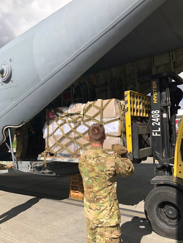 Dyess Airmen unload school supplies in Colombia