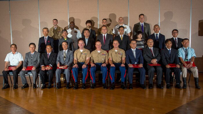 Japanese employees retire from air station with 488 combined years of service
