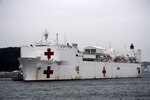 USNS Mercy (T-AH 19) pulls into port at Fleet Activities Yokosuka. Mercy is making port visits to Yokosuka and Tokyo to promote relationships between U.S. Navy Sailors and Japanese citizens through cultural exchange and bilateral training.