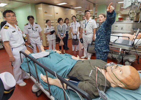 Lt. Kelly Keck, assigned to the Military Sealift Command hospital ship USNS Mercy (T-AH 19), speaks to a group of U.S. Navy and Japan Maritime Self-Defense Force sailors during a subject-matter expert exchange aboard Mercy. Mercy is making port visits to Yokosuka and Tokyo to promote relationships between U.S. Navy Sailors and Japanese citizens through cultural exchange and bilateral training.