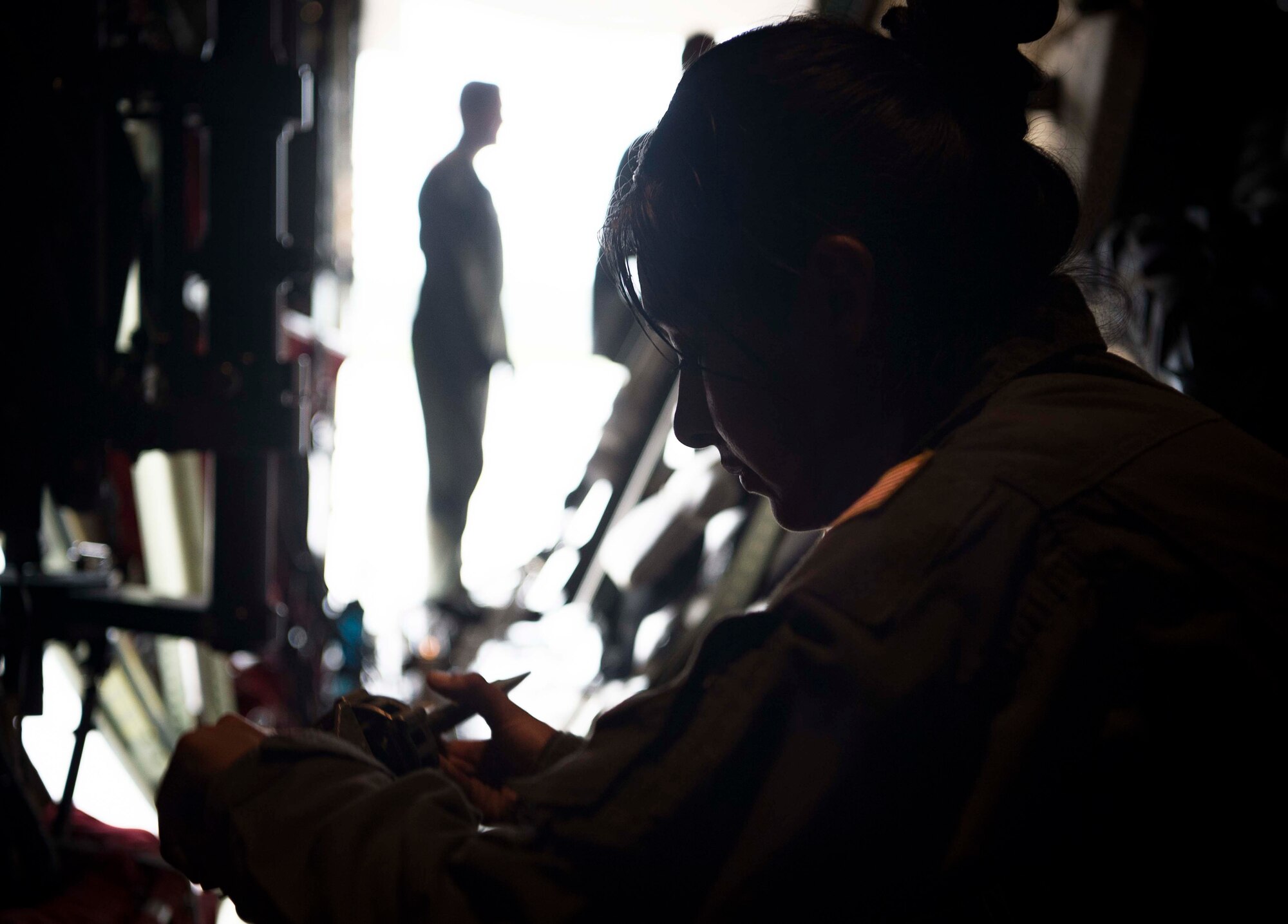 U.S. Air Force Senior Airman Vanessa Soriano-Cervantes, 37th Airlift Squadron C-130J Super Hercules aircraft loadmaster, secures a vehicle for transport and aerial delivery inside a C-130J on Ramstein Air Base, Germany, June 12, 2018. The 37th AS loadmasters support air drops and deliveries for U.S. European Command and U.S. Africa Command. They are the only airlift squadron based in theater for U.S. Air Forces in Europe, granting them a large amount of air time. (U.S. Air Force photo by Senior Airman Elizabeth Baker)