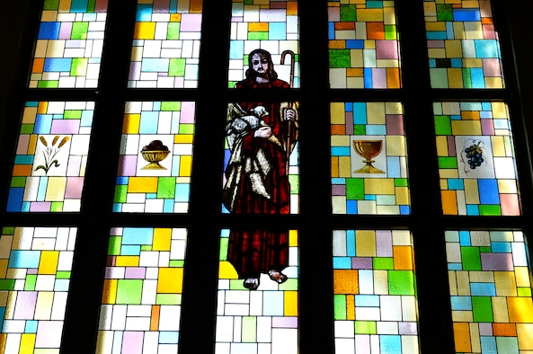 Stained glass adorns the window of the Southside Chapel on Ramstein Air Base, Germany, April 19, 2018. The 86th Airlift Wing Chaplain Corps aims to meet the spiritual needs of Airmen and their families in the Kaiserslautern Military Community. (U.S. Air Force photo by Senior Airman Joshua Magbanua)