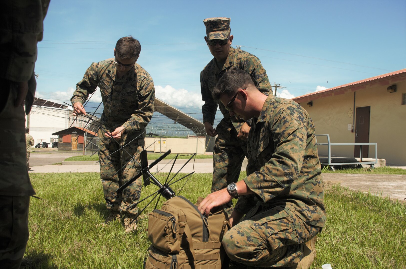 Marines with Special Purpose Marine Air-Ground Task Force - Southern Command’s communications section prepare to sync their equipment with that of their counterparts in Joint Task Force - Bravo's 1st Battalion, 228th Aviation Regiment’s communications section during a communications exercise aboard Soto Cano Air Base, Honduras, to prepare for future joint-level operations, June 19, 2018. The Marines and sailors of SPMAGTF-SC are conducting security cooperation training and engineering projects alongside partner nation military forces in Central and South America. The unit is also on standby to provide humanitarian assistance and disaster relief in the event of a hurricane or other emergency in the region.