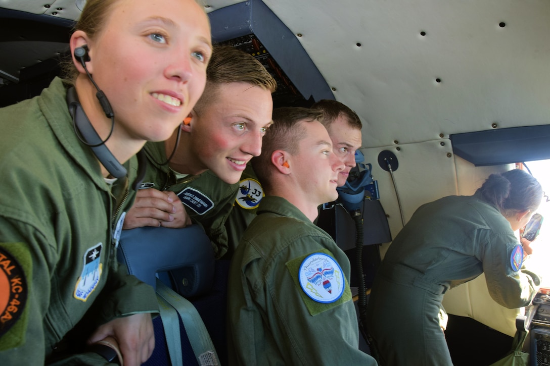 U.S. Air Force Academy cadets peer through the windshield of a C-5M Super Galaxy aircraft during an incentive flight from Joint Base San Antonio-Lackland, Texas, June 8, 2018. As a C-5M unit, the 433rd Airlift Wing stands ready to provide combat ready airlift and many other types of missions around the globe on a moment's notice. (U.S. Air Force photo by Staff Sgt. Lauren M. Snyder)