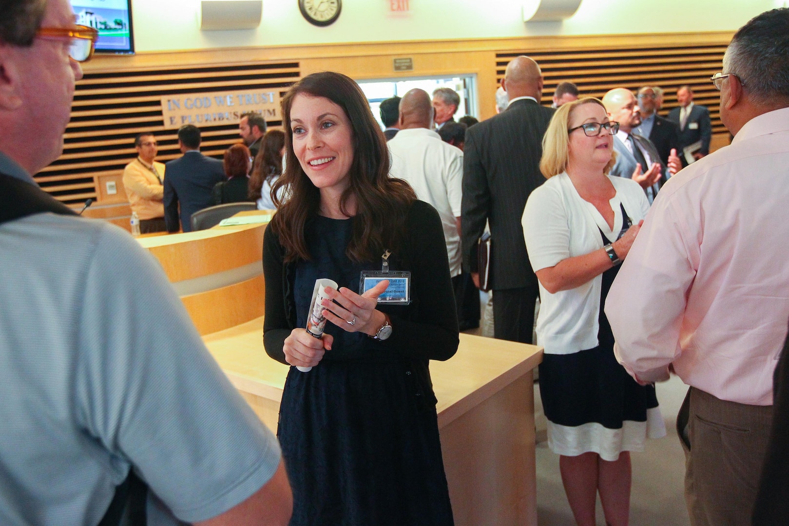 180619-N-HW977-471 CORONA, Calif. (June 19, 2018) Kim Brown, second from left, and Desiree DeRuyter, Naval Surface Warfare Center (NSWC), Corona Division Contracts Department representatives, chat with potential industry partners during Industry Day at Corona City Hall. Organized in cooperation with Riverside Community College District (RCCD) Procurement Technical Assistance Center (PTAC), the event included a forecast of NSWC Corona future contracting/subcontracting opportunities as well as meet-and-greet opportunities for suppliers to network with technical department personnel. (U.S. Navy photo by Greg Vojtko/Released)