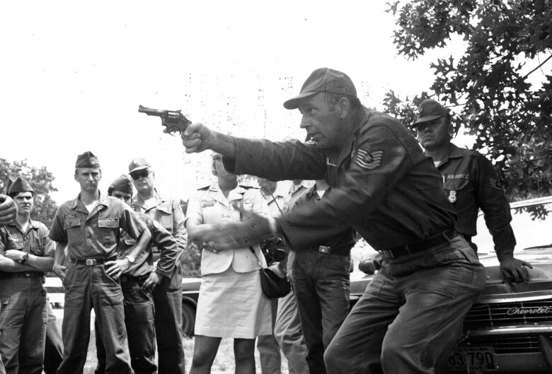 Airmen complete training during the training encampment June 16-17, 1956 at Camp Williams (now Volk Field), Wis.