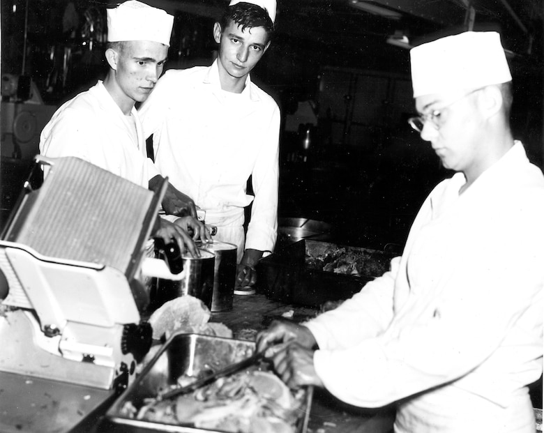Cooks prepare a meal at Camp Williams, Wis. during summer training encampment June 16-17, 1956.