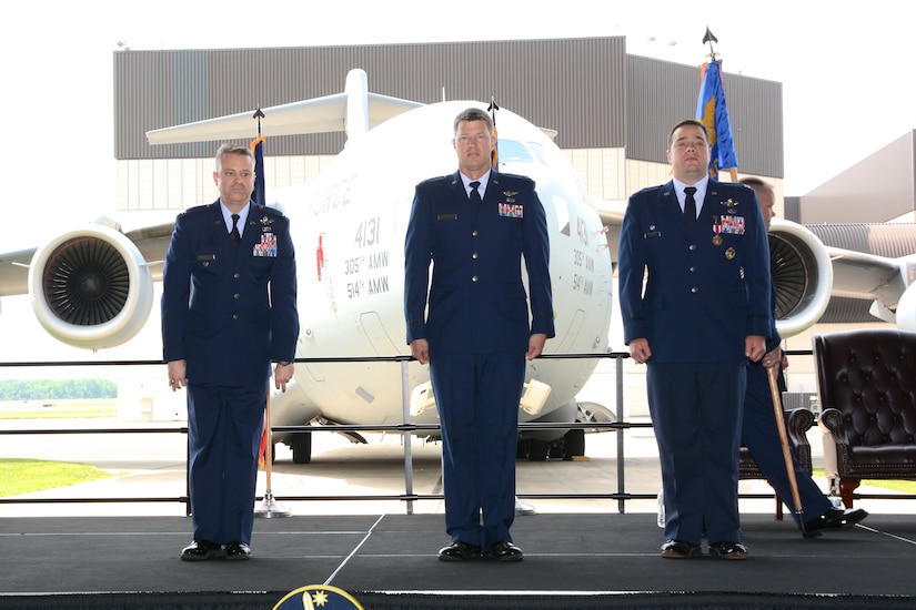 U.S. Air Force Col. Glenn A. Rineheart, Air Mobility Command Test and Evaluation director, Scott AFB, IL, facilitates the AMCTES change of command ceremony as U.S. Air Force Lt. Col. E. Race Steinfort assumes command from U.S. Air Force Lt. Col. Anthony M. Gurrieri during the ceremony, June8, 2018. Gurrieri was selected for reassignment to Joint Base Charleston, South Carolina, where he will serve as the 437th Operations Group deputy commander.