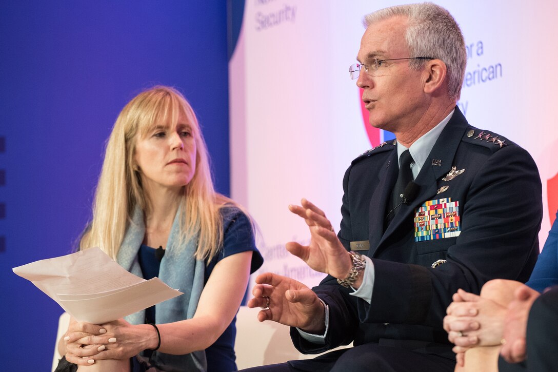 Air Force Gen. Paul J. Selva, vice chairman of the Joint Chiefs of Staff, speaks while sitting on stage beside a moderator.