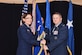 U.S. Air Force Maj. Gen. Mary O’Brian, 25th Air Force commander, hands the 480th Intelligence, Surveillance and Reconnaissance Wing guidion to the wing’s new commander, Col. Max Pearson, during a change of command ceremony June 19, 2018, at Joint Base Langley-Eustis, Virginia.