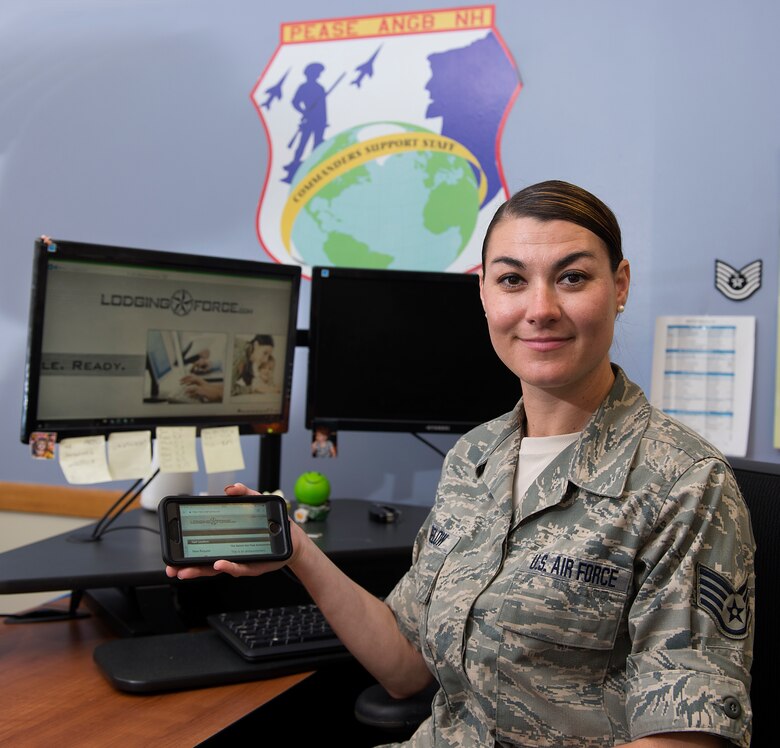 Staff Sgt. Brittany G. Bigelow, a personnelist assigned to the 157th Maintenance Group, poses for a portrait on June 19, 2018 at Pease Air National Guard Base, N.H.  Bigelow has worked to bring the Lodging Force application to the Wing, to improve the process of booking hotel accommodations for airmen who are in a duty status, saving working hours and funds. (N.H. Air National Guard photo by Staff Sgt. Kayla White)