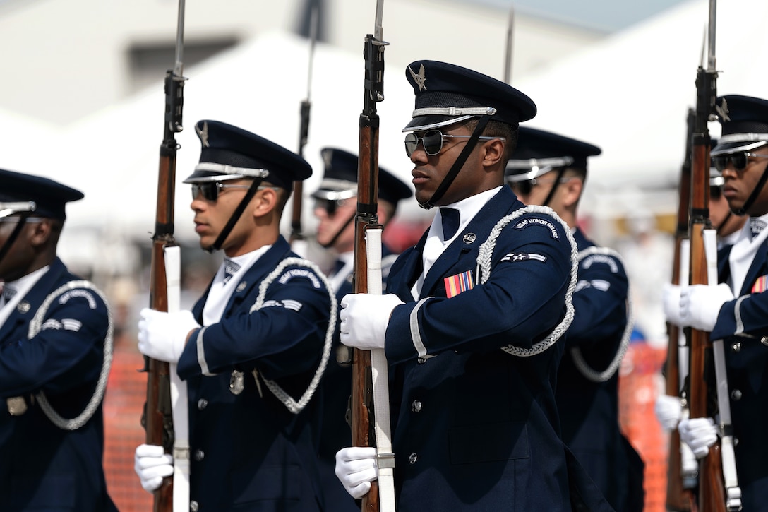 Air Force Honor Guard Drill Team performs at the opening ceremony.