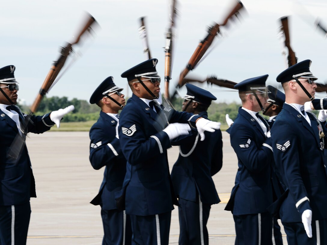 Air Force Honor Guard Drill Team performs at the opening ceremony.