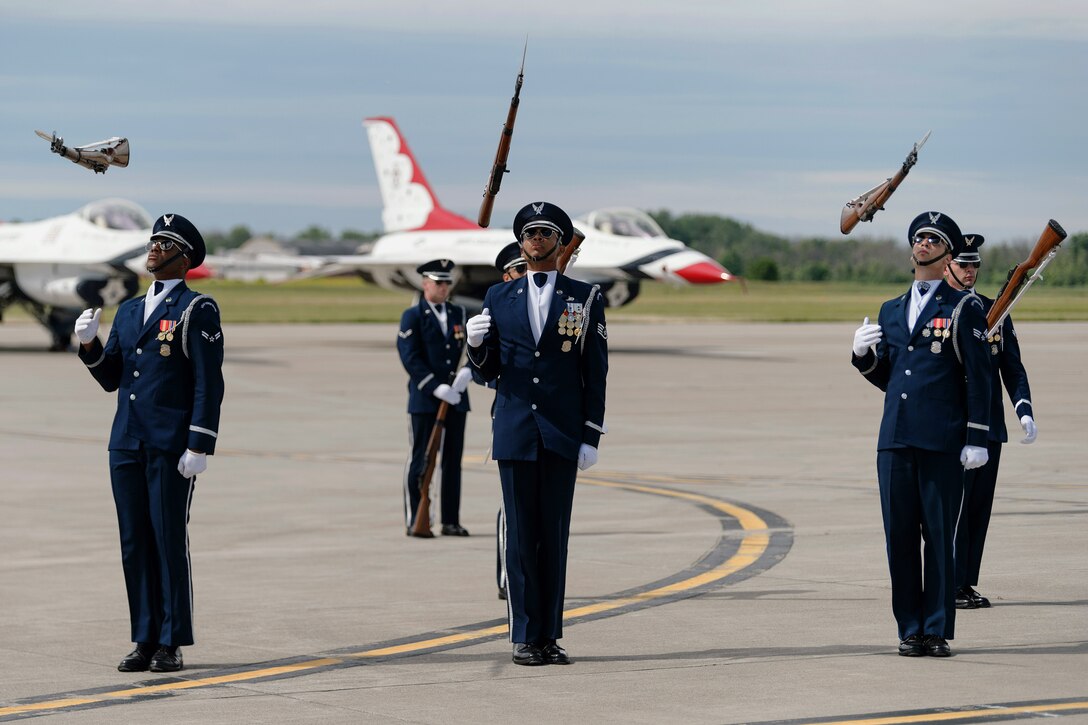 Air Force Honor Guard Drill Team performs at the opening ceremony.
