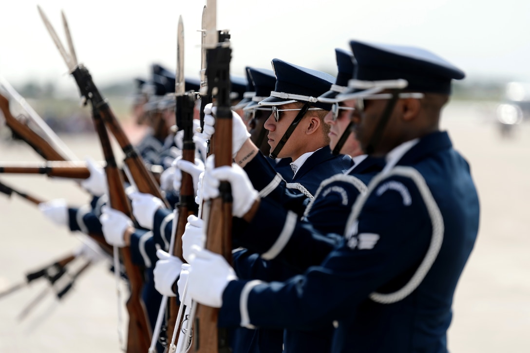 Air Force Honor Guard Drill Team performs at the opening ceremony.