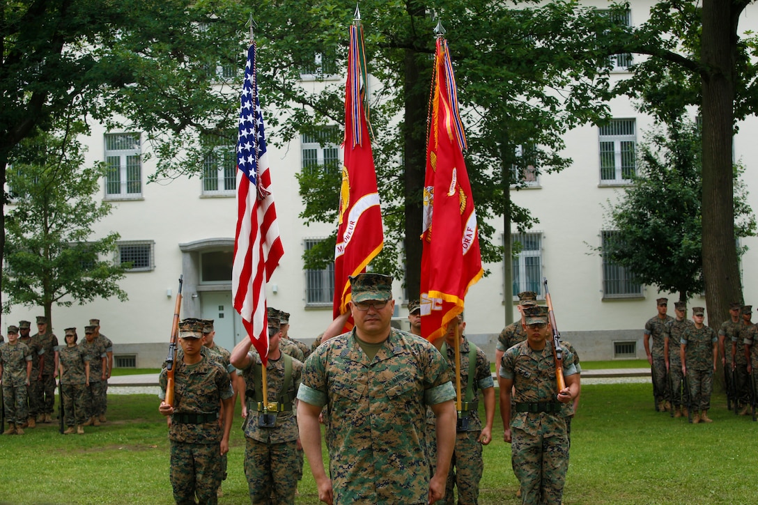 U.S. Marine Corps Sgt. Maj. William Frye stands in front of Marines assigned to Headquarters Company, Marine Forces Europe and Africa (MARFOREURAF) on Panzer Kaserne, Stuttgart, Germany, on June 14, 2018. Frye was participating in his Relief and Retirement ceremony.(U.S. Marine Corps photo by Lance Cpl. Menelik/ released)