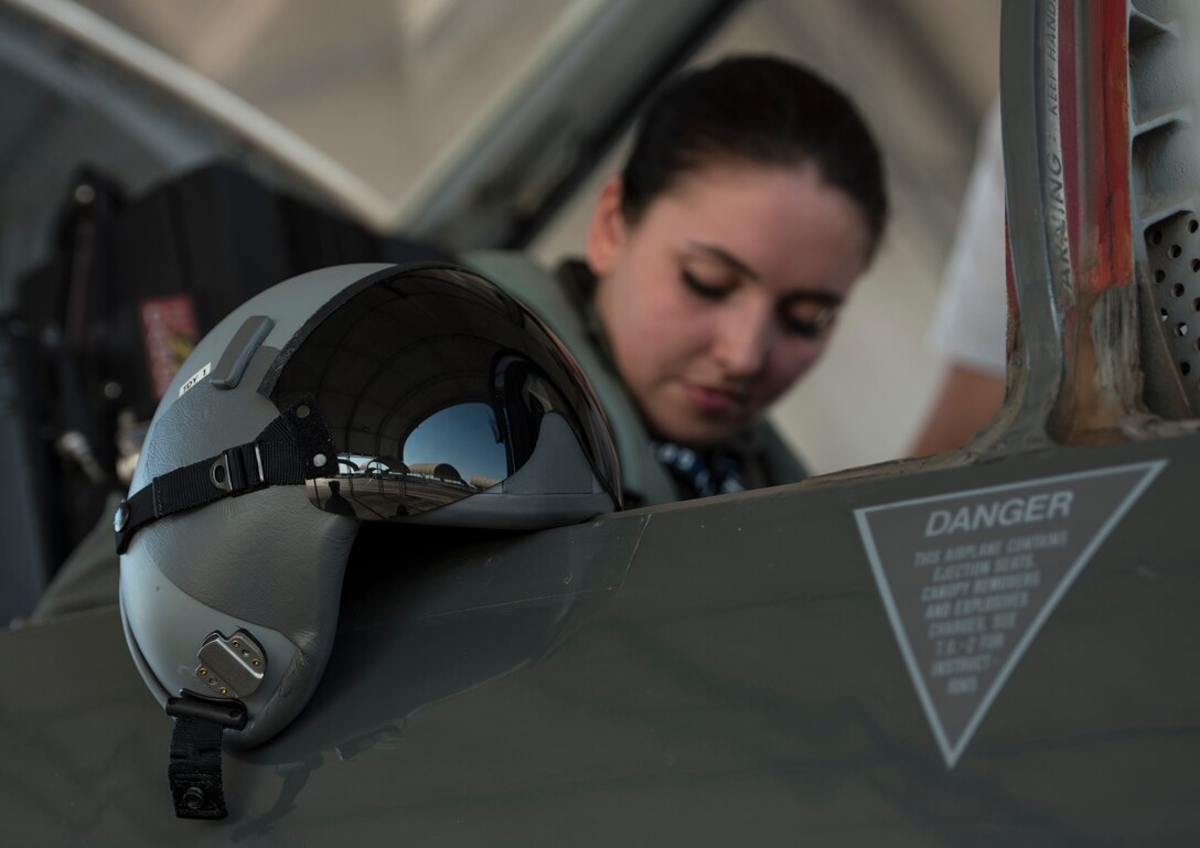 U.S. Air Force Airman 1st Class Brianna Lisner, 58th Fighter Squadron aerospace scheduler, buckles into a T-38 Talon June 7, 2018, at Eglin Air Force Base, Fla. Lisner was one of two selects for the T-38 insentive flight after going through a week of intensive training. (U.S. Air Force photo by Airman 1st Class Emily Smallwood)