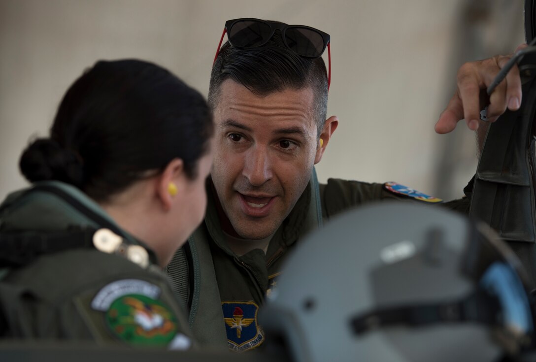 U.S. Air Force Airman 1st Class Brianna Lisner, 58th Fighter Squadron aerospace scheduler, listens to instruction June 7, 2018, at Eglin Air Force Base, Fla. The incentive flight selects went through a series of training to get ready for this flight. (U.S. Air Force photo by Airman 1st Class Emily Smallwood)