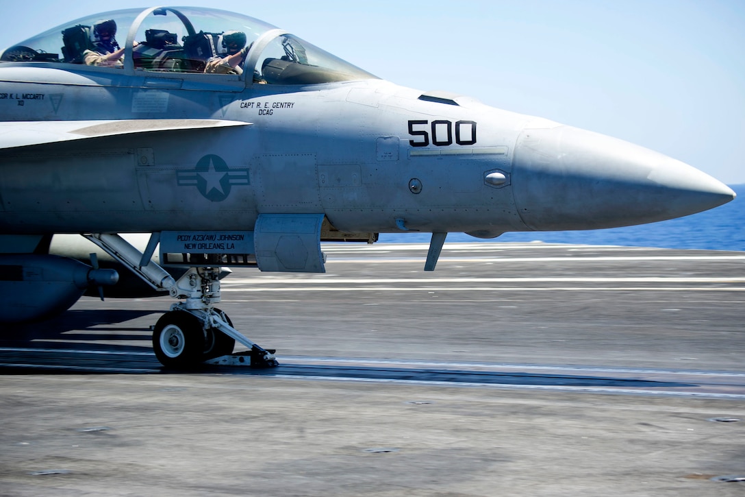 An EA-18G Growler prepares to launch from the aircraft carrier USS Harry S. Truman.