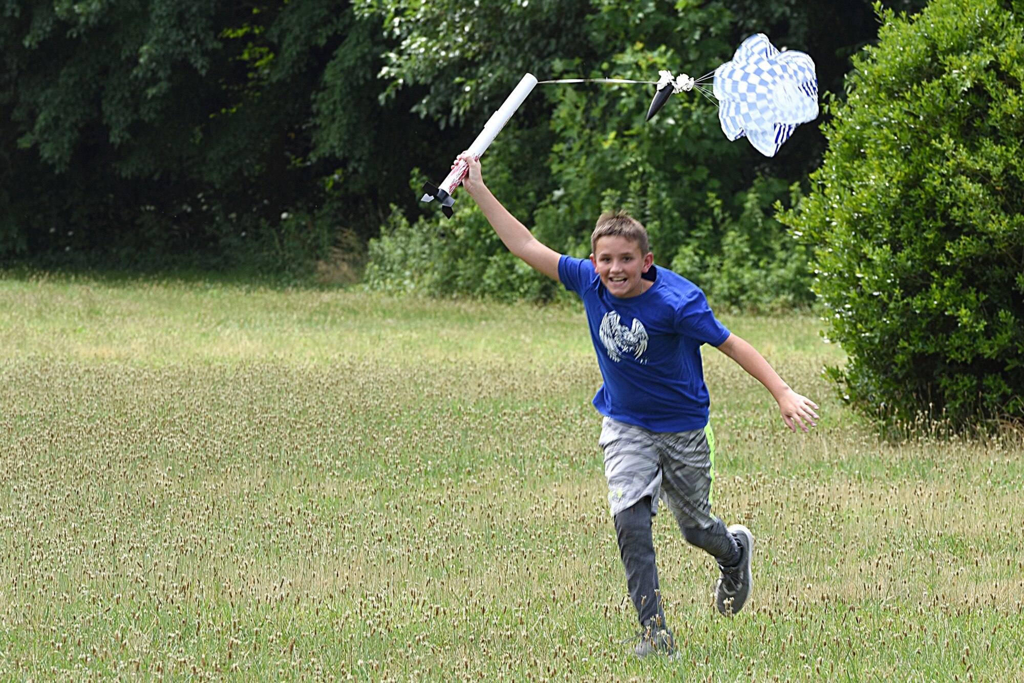Louis Helms, son of U.S. Air Force Major Jeannie Helms, 145th Comptroller Flight commander, launches and catches his model rocket near Reid Park Academy Charlotte, N.C., June 21, 2018. Helms, along with other campers and teachers are part of the annual Department of Defense STARBASE summer camp program with the North Carolina Air National Guard and they learn various applications of science, technology, engineering, and math.
