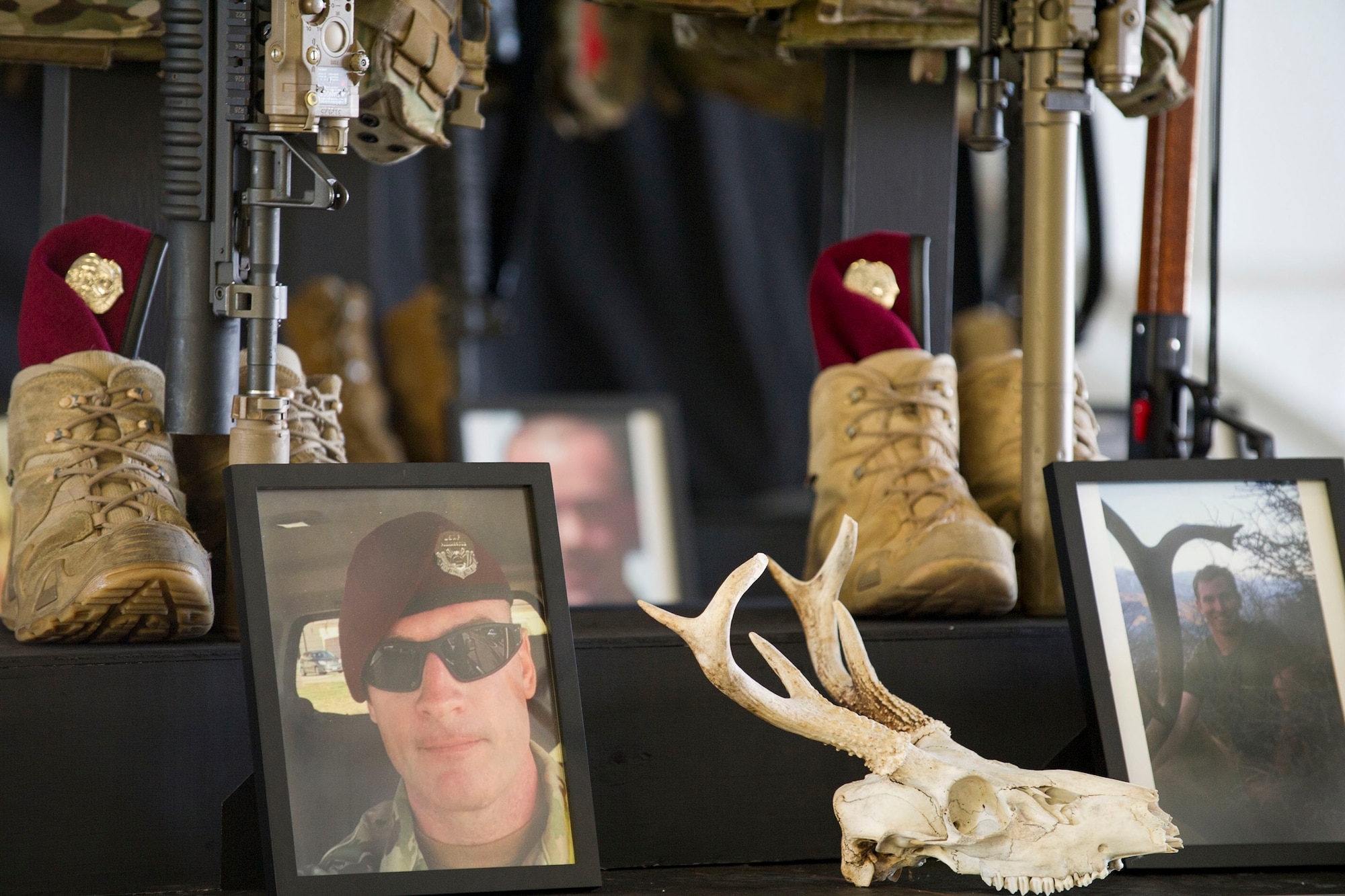 Master Sgt. William Posch, shown left, 36, Indialantic, Florida, and Staff Sgt. Carl Enis, shown right, 31, Tallahassee, Florida, were pararescuemen assigned to the 308th Rescue Squadron, Patrick Air Force Base, Florida, providing combat rescue support for Inherent Resolve when they were among 7 Airmen killed in an HH-60G Pave Hawk helicopter crash in Anbar Province, Iraq, March 15, 2018. Shown is part of a display at a memorial service held at Patrick Air Force Base March 27, 2018. (U.S. Air Force photo)