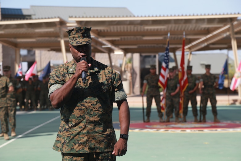 Lt. Col. Barian Woodward, off-going commanding officer, Communication Training Battalion, Marine Corps Communication-Electronics School, gives his remarks at a change-of-command ceremony aboard the Marine Corps Air Ground Combat Center, Twentynine Palms, Calif., June 13, 2018. During the ceremony, Woodward relinquished command of the battalion to Lt. Col. Russell Savatt. (U.S. Marine Corps photo by Lance Cpl. Preston L. Morris)