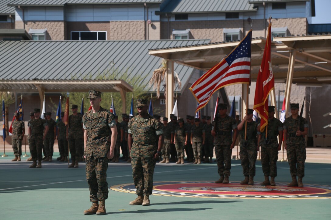 Lt. Col. Barian Woodward, off-going commanding officer, Communication Training Battalion, Marine Corps Communication-Electronics School, stands before the colors during a change-of-command ceremony aboard the Marine Corps Air Ground Combat Center, Twentynine Palms, Calif., June 13, 2018. During the ceremony, Woodward relinquished command of the battalion to Lt. Col. Russell Savatt. (U.S. Marine Corps photo by Lance Cpl. Preston L. Morris)
