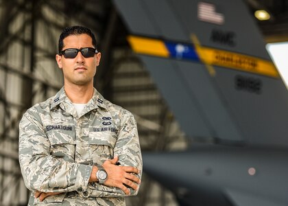 Capt. Elie Elchartouni, 437th Maintenance Flight officer in charge, poses for a portrait inside a hangar on Joint Base Charleston, S.C. June 6, 2018. Elchartouni immigrated to America from Lebanon when he was 18 years old and joined the Air Force to give back to his country.