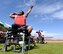 Michael Wishnia, Paralympic shotputter and Marine Corps veteran, prepares to throw a shotput during training at Luke Air Force Base, Ariz., June 13, 2018. As part of a partnership between the Department of Defense and the International Paralympic Committee, adaptive athletes and Paralympic prospects can utilize sports and medical facilities at military bases to prepare for competitions. (U.S. Air Force photo by Senior Airman Ridge Shan)
