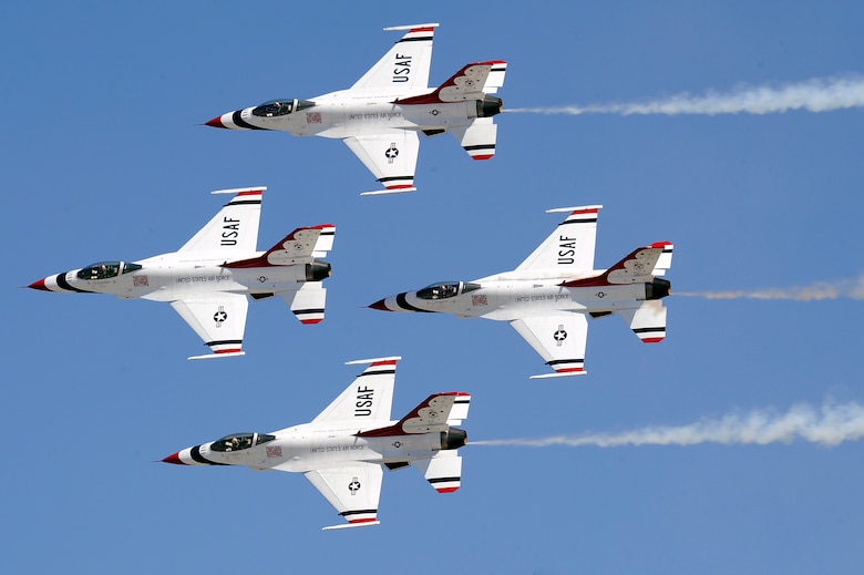 The U.S. Air Force Thunderbirds perform the "Diamond pass and review" at Travis AFB, California on July 30, 2011.   (U.S. Air Force photo/Staff Sgt Richard Rose Jr.)