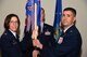 U.S. Air Force Col. Janet Urbanski, 17th Medical Group commander, passes the 17th Medical Operation Squadron guideon to Lt. Col. Shaun Westphal, 17th MDOS incoming commander, at the 17th MDOS Change of Command at the Event Center on Goodfellow Air Force Base, Texas, June 21, 2018. The change of command ceremony is a time honored military tradition that signifies the orderly transfer of authority. (U.S. Air Force photo by Airman 1st Class Seraiah Hines/Released)