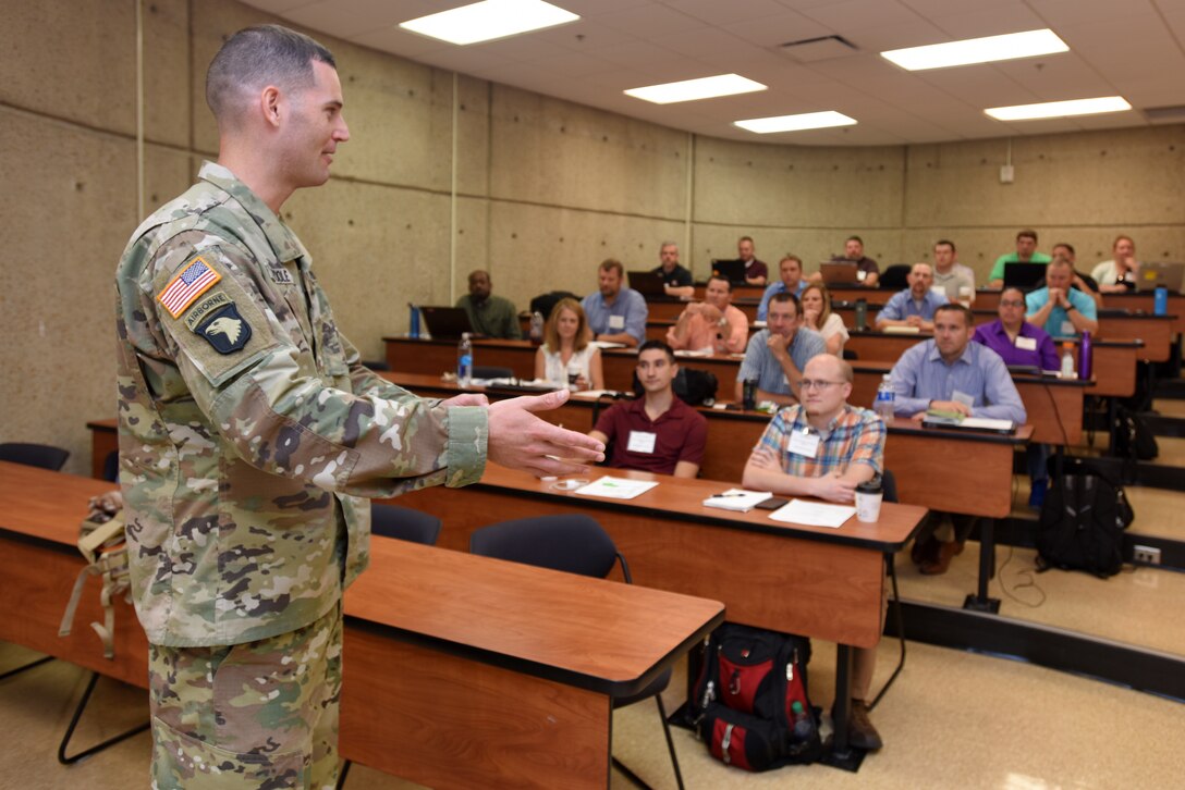 Maj. Justin Toole, U.S. Army Corps of Engineers Nashville District deputy commander, encourages 36 participants of the Hydropower Acquisition Course June 19, 2018 at Tennessee State University’s Avon Williams Campus in Nashville, Tenn., to network and freely share expertise.  The purpose of the course is to synchronize best practices and work on improving how the Corps of Engineers executes a hydropower project from cradle to grave. (USACE Photo by Lee Roberts)