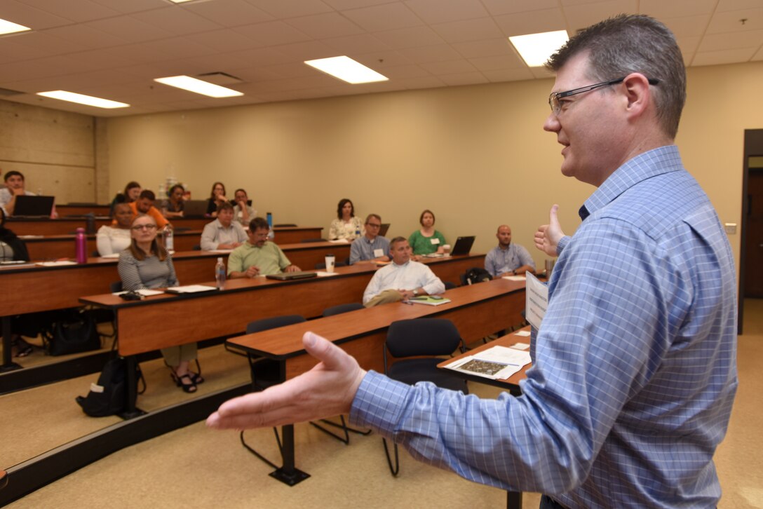 Shawn Worthington, U.S. Army Corps of Engineers Northwestern Division in Portland, Ore., talks with participants taking the Hydropower Acquisition Course June 19, 2018 in Nashville, Tenn., about sharing processes, ideas and lessons learned, which is critical given the aging infrastructure at the hydropower plants where equipment and power units need to be rehabilitated, modernized and upgraded. (USACE Photo by Lee Roberts)