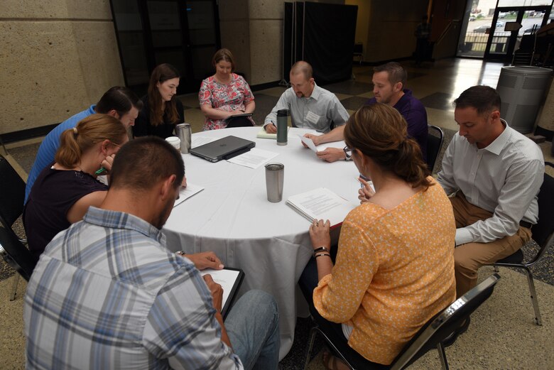 Participants of the Hydropower Acquisition Course consider scenarios requiring them to identify issues and develop proposed solutions during an exercise to culminate the course June 22, 2018 in Nashville, Tenn., at Tennessee State University’s Avon Williams Campus. (USACE Photo by Lee Roberts)