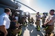 Firefighters from the 23d Civil Engineer Squadron (CES), discuss their performance following an HH-60G Pave Hawk simulated rescue training scenario, June 20, 2018, at Moody Air Force Base, Ga. 23d CES firefighters conducted the training to evaluate their overall knowledge and preparation of how to properly shut down and rescue crew members from an HH-60. (U.S. Air Force photo by Airman 1st Class Eugene Oliver)