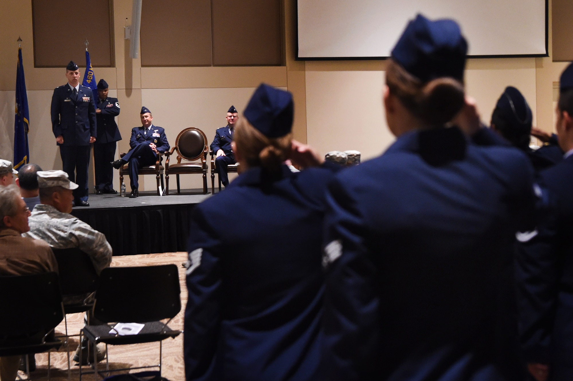 Airmen from the 460th Medical Operations Squadron salute Lt Col. Christian Smith for the first time after he takes command, June 15, 2018, on Buckley Air Force Base, Colorado. Col. Matthew Hanson, 460th Medical Group commander, presided over the ceremony and transferred the guidon from Lt. Col. Jon O’Pry, 460th Medical Operations Squadron outgoing commander, to Lt. Col. Smith, symbolizing the official change of command. (U.S. Air Force photo by Airman 1st Class Codie Collins)