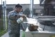 Senior Airman Kristian Martinez-felix, a 319th Civil Engineer Squadron heating, ventilation, air conditioning and refrigeration apprentice cleans an air conditioning system June 20, 2018, on Grand Forks Air Force Base, North Dakota. Martinez-felix said that by cleaning the air conditioning systems, it ensures they are functioning properly and that no excess bacteria are spread through ventilations. (U.S. Air Force photo by Airman 1st Class Melody Wolff)