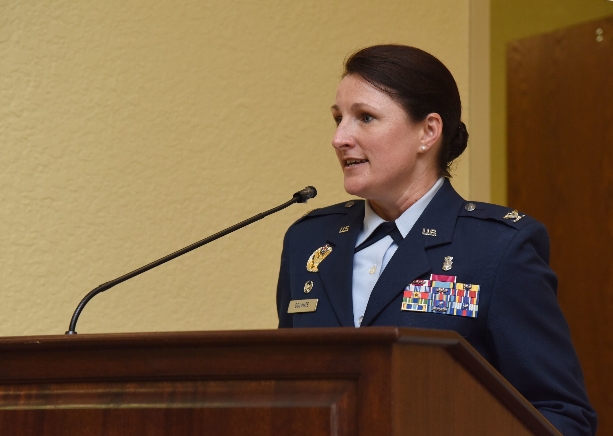 U.S. Air Force Col. Beatrice Dolihite, incoming 81st Medical Group commander, delivers remarks during the 81st MDG change of command ceremony in the Bay Breeze Event Center at Keesler Air Force Base, Mississippi, June 22, 2018. Dolihite assumed command from Col. Jeannine Ryder, outgoing 81st MDG commander. (U.S. Air Force photo by Kemberly Groue)