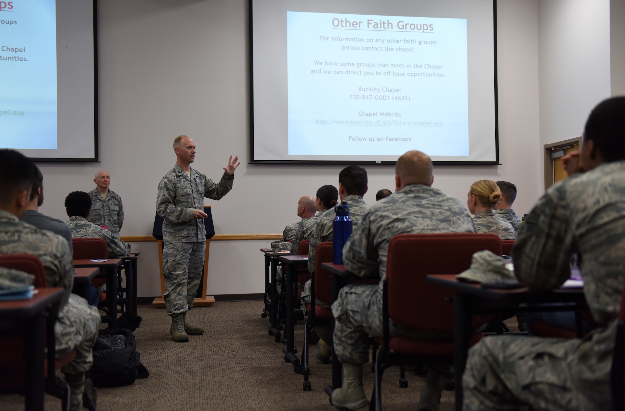 U.S. Air Force Capt. Samuel McClellan, 460th Space Wing chaplain, speaks to members of Team Buckley during a newcomer’s orientation at Buckley Air Force Base, Colorado, June 20, 2018.