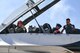 Sergeant Aaron Thompson, Utah Washington County Sheriff, waves at his family and friends before flying with the U.S. Air Force Thunderbirds June 22, 2018, at Hill Air Force Base, Utah. Thompson was selected to fly with the Thunderbirds as part of their Hometown Hero program. (U.S. Air Force photo by Cynthia Griggs)