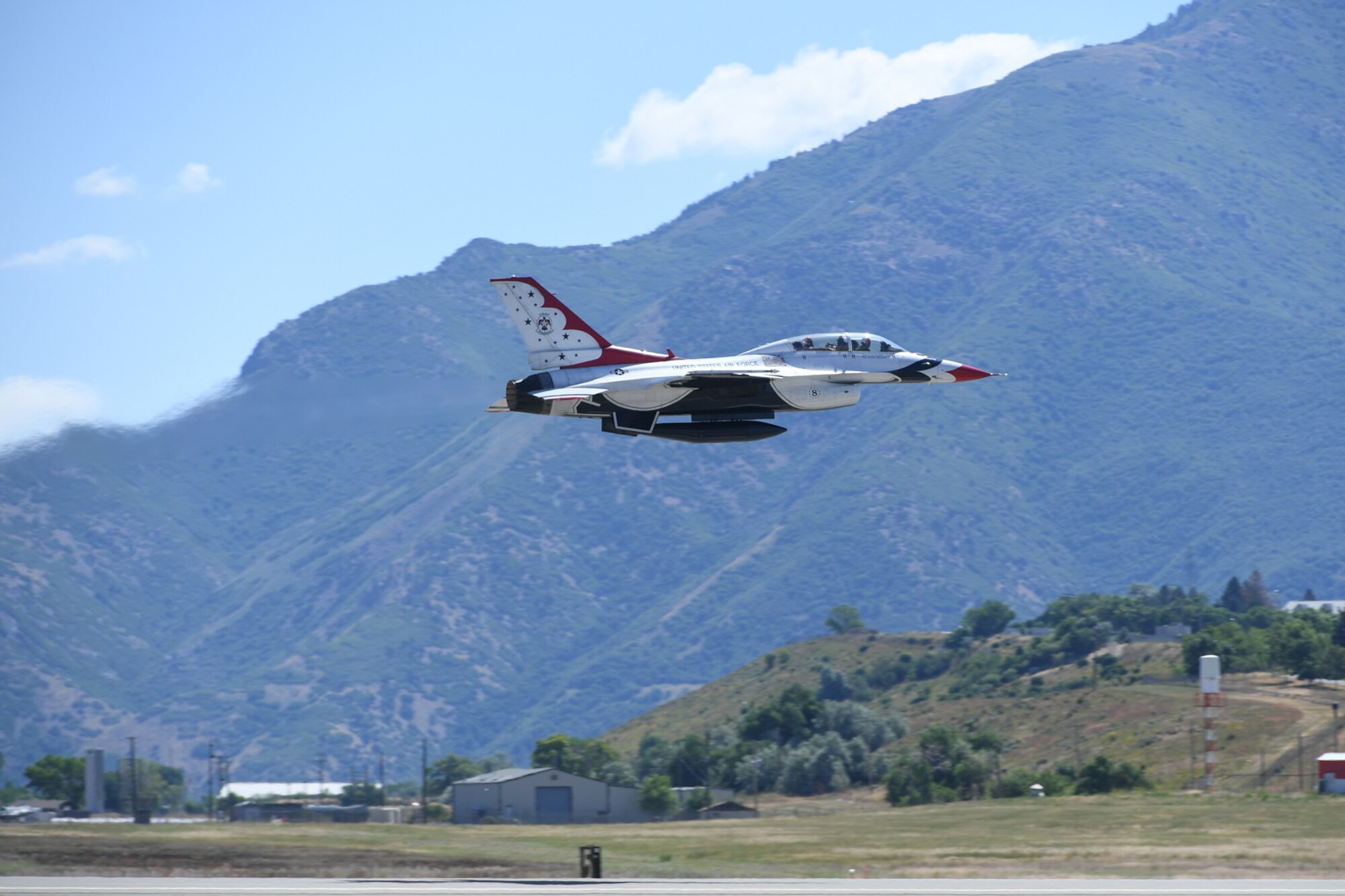 Sergeant Aaron Thompson, Utah Washington County Sheriff, takes off with Maj. Randen Felker, U.S. Air Force Thunderbirds pilot, June 22, 2018, at Hill Air Force Base, Utah. Thompson was selected to fly with the Thunderbirds as part of their Hometown Hero program. (U.S. Air Force photo by Cynthia Griggs)
