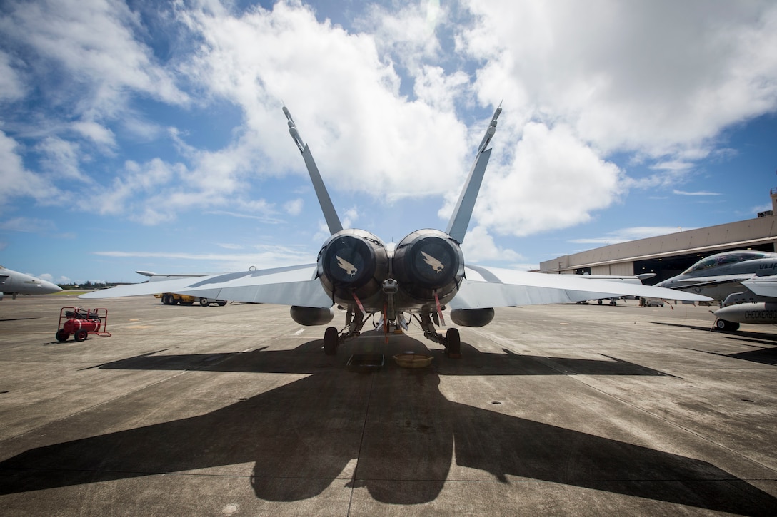 A F/A-18 Hornet aircraft assigned to Marine All-Weather Fighter Attack Squadron 533 sits at Hangar 105, Marine Corps Air Station Kaneohe Bay, Marine Corps Base Hawaii, June 22, 2018. The squadron is currently aboard MCBH to support Exercise Rim of the Pacific 2018.