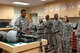 Technical Sgt. Quinton Fitzgerald, Aircrew Flight Equipment flight, gives a demonstration to the Air Education and Training Command leaders about how aircrew use the equipment at Osan Air Base, Republic of Korea on June 15, 2018. During the demonstration, the chiefs asked the Airmen how long the equipment may be serviceable for and solicited areas of improvement. (U.S Air Force photo by Staff Sgt. Benjamin Raughton)